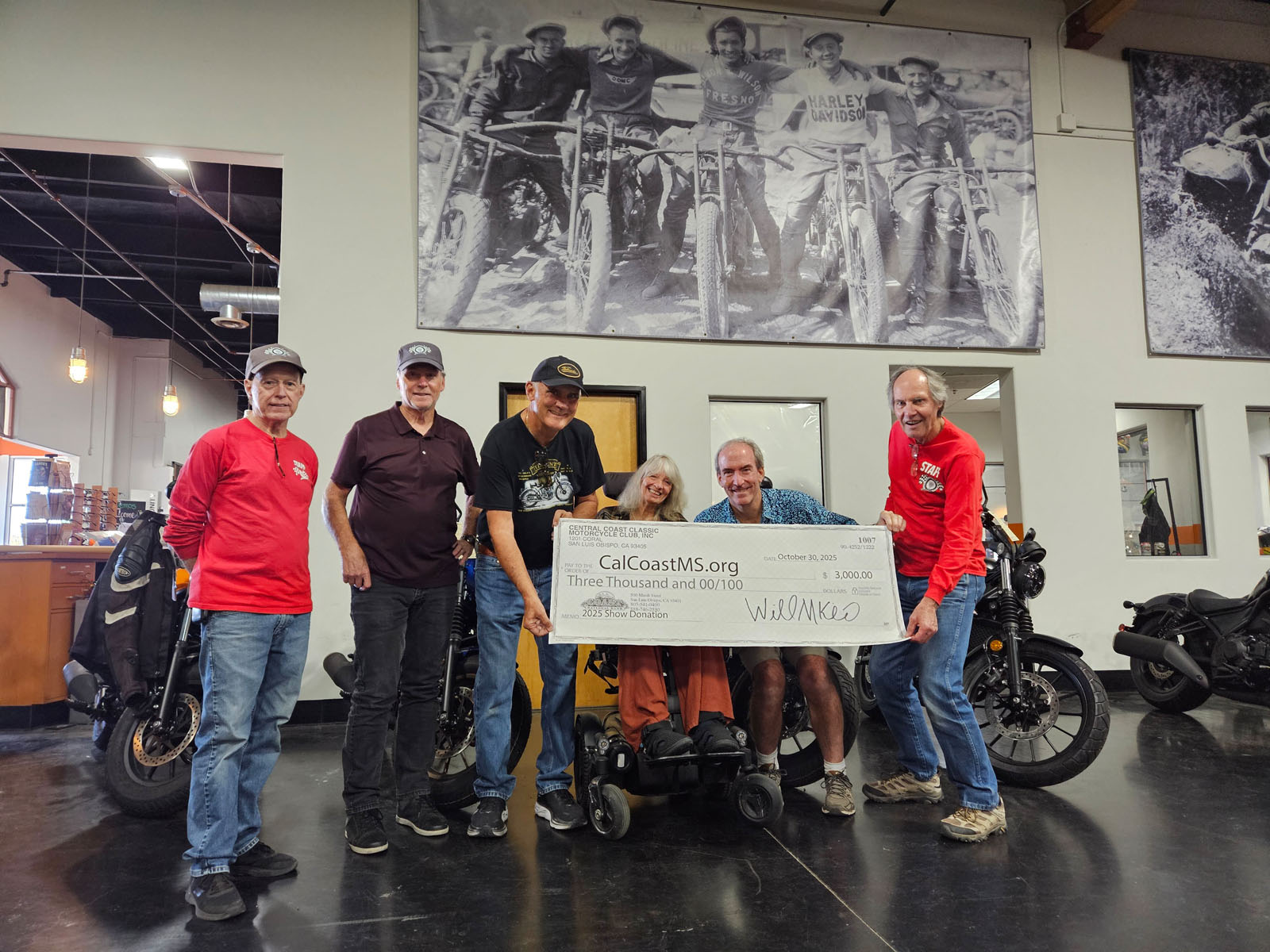 CCCMC presenting a $3000 check to Steve and Sam Mead of CalCoast MS
